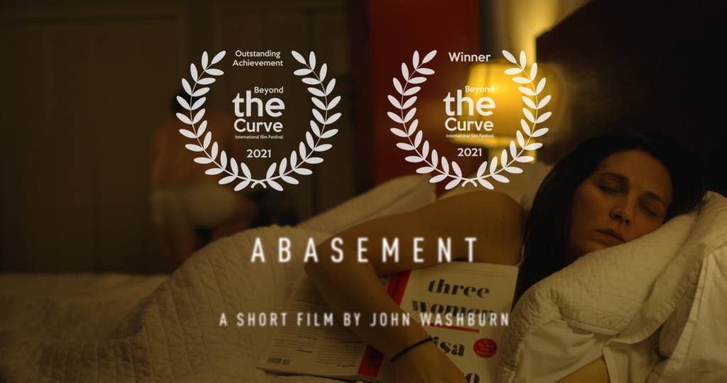 Abasement poster with laurels for "outstanding achievement" and "winner" best horror