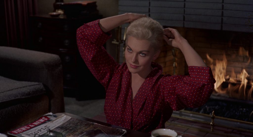 Kim Novak wearing a red robe. Color palettes